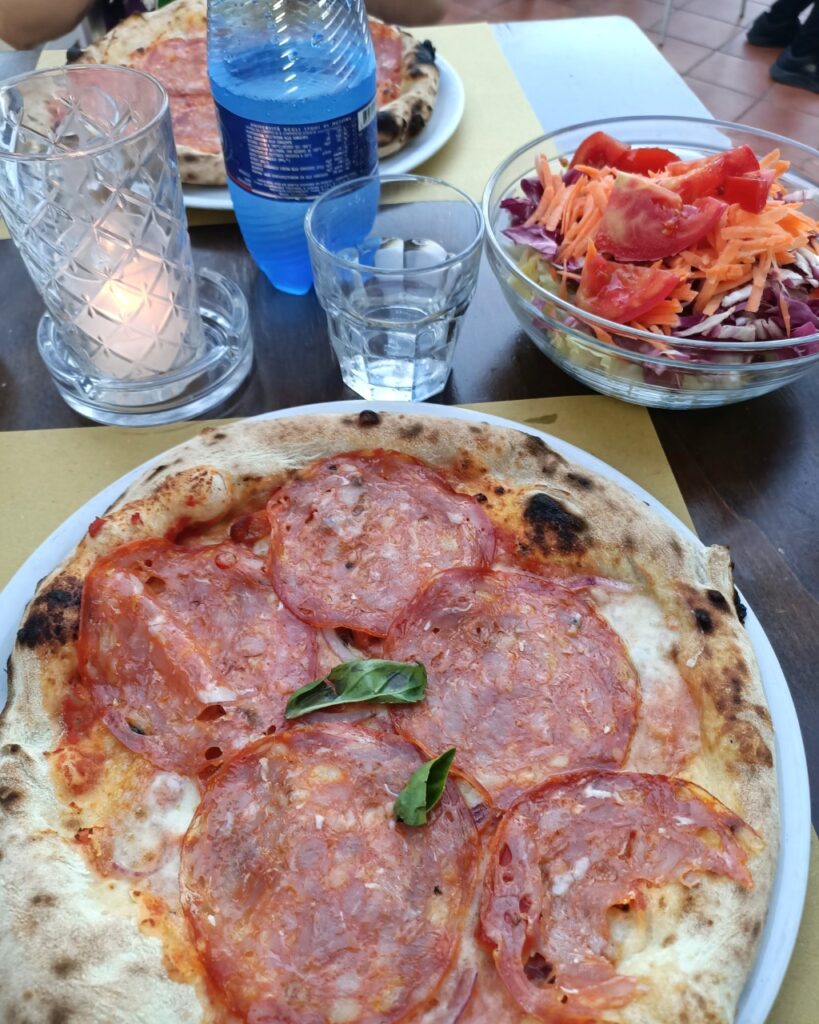 pizza in restaurant in taormina sicily