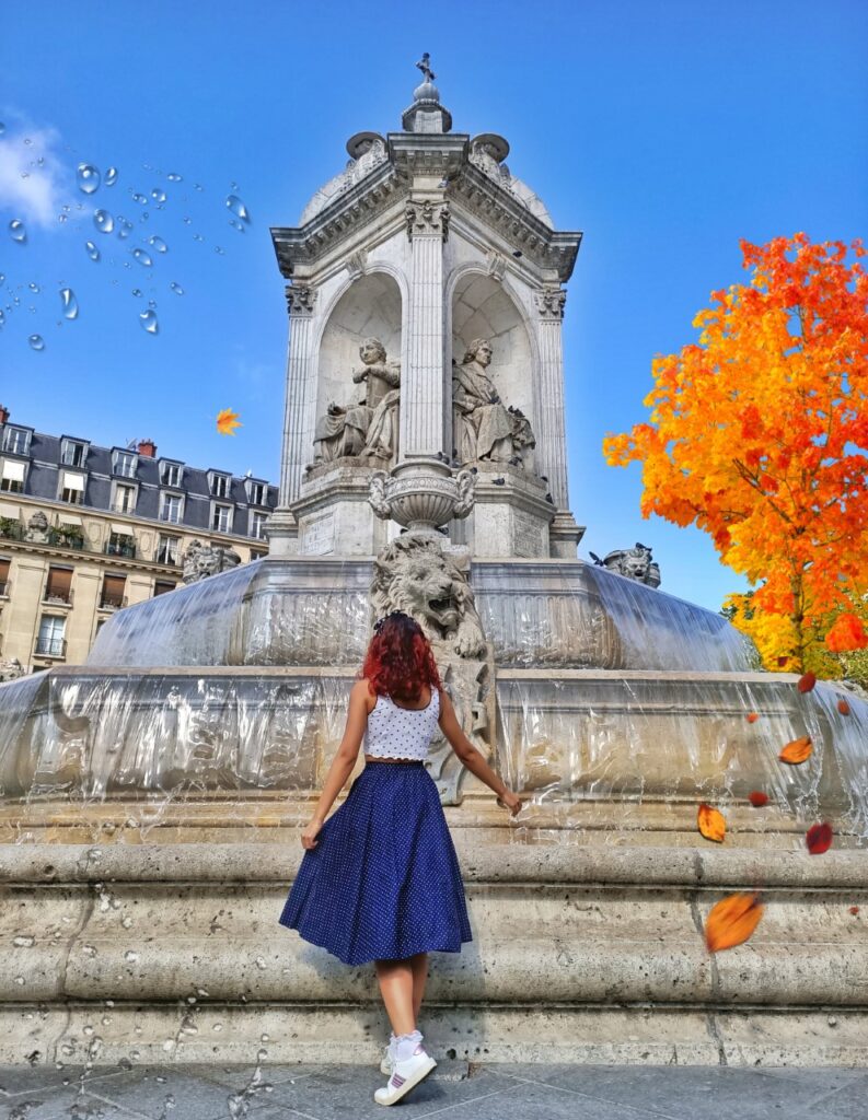 parisian girl standing in front of st sulpice fountain in paris, france with autumn landscape