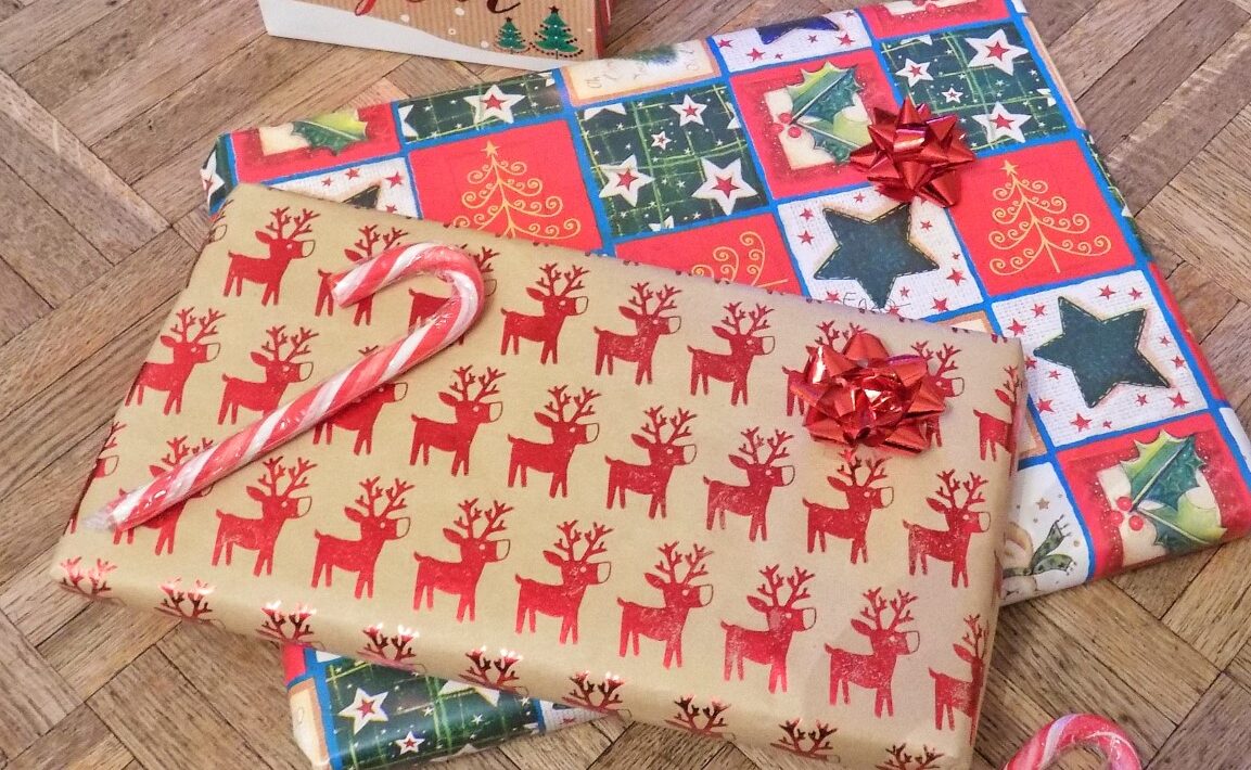 Christmas presents wrapped with candycane and chocolate