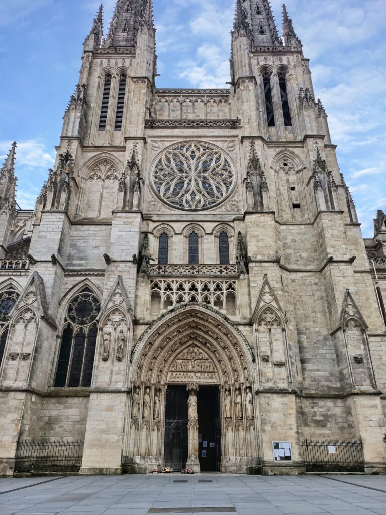 Cathedral of Saint Andrew in Bordeaux, France. The façade of the church and the blue sky. 