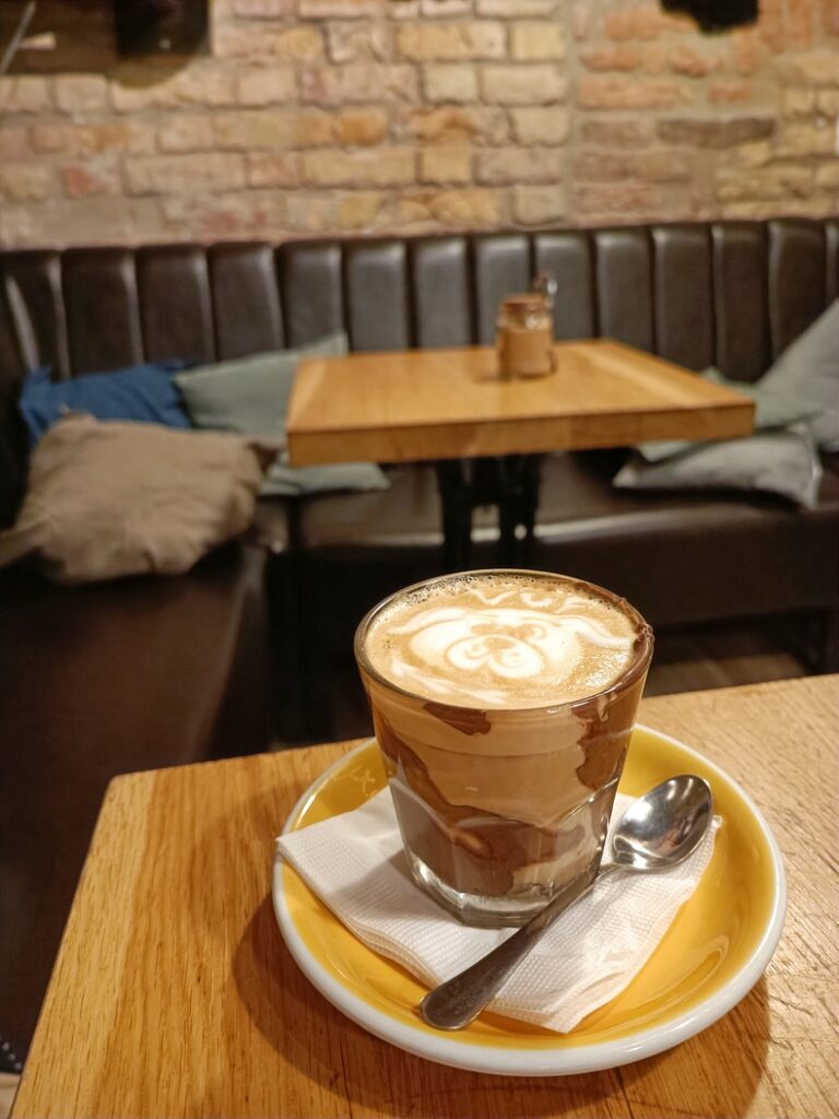 A Nutella coffee with cute dog latte art at BAR 9, a great café in Budapest.